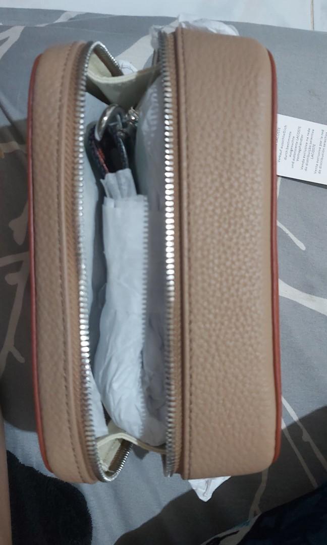 Lacoste Croc Crossbody bag 2021 (Category: Cross-body Bags) located in Santa Rosa. Submitted by kindshoppe (Listing ID 1107097580, Image 3). Description: NO SWAP STRICTLY SELLING ONLY For sale as is where is Women's Croco Crew Grained Leather Zip Shoulder Bag with Striped Strap A A detachable shoulder strap with contrast stripes turns this little Lacoste Women's Croco Crew Grained Leather Zip Shoulder Bag with Striped strap one of this season's m