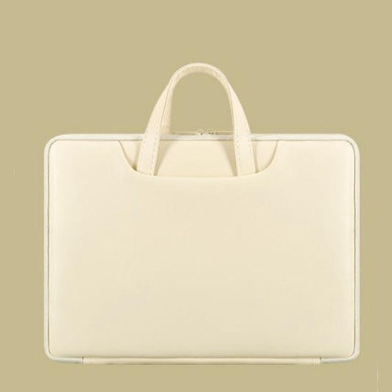 beige laptop bag