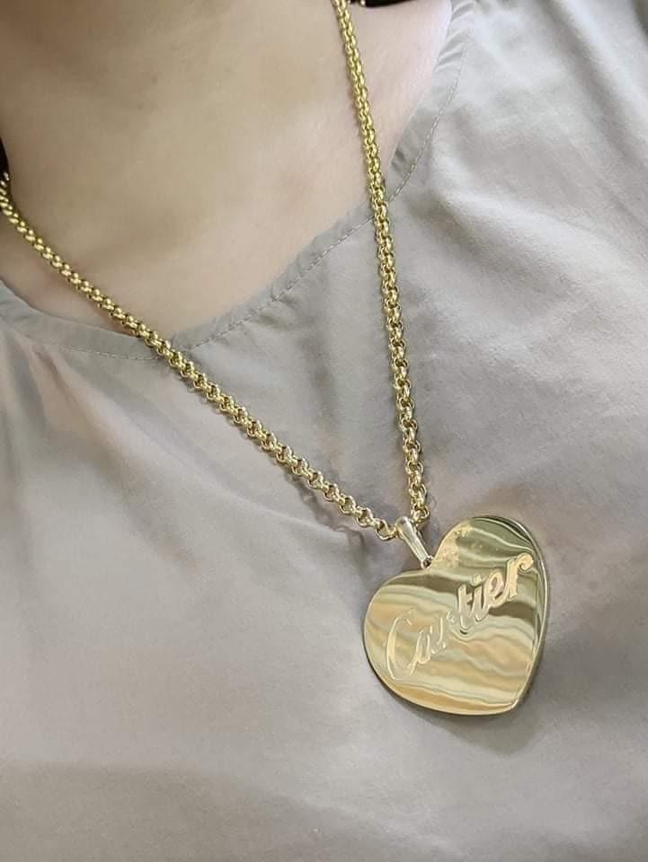 Cartier gold pendant top