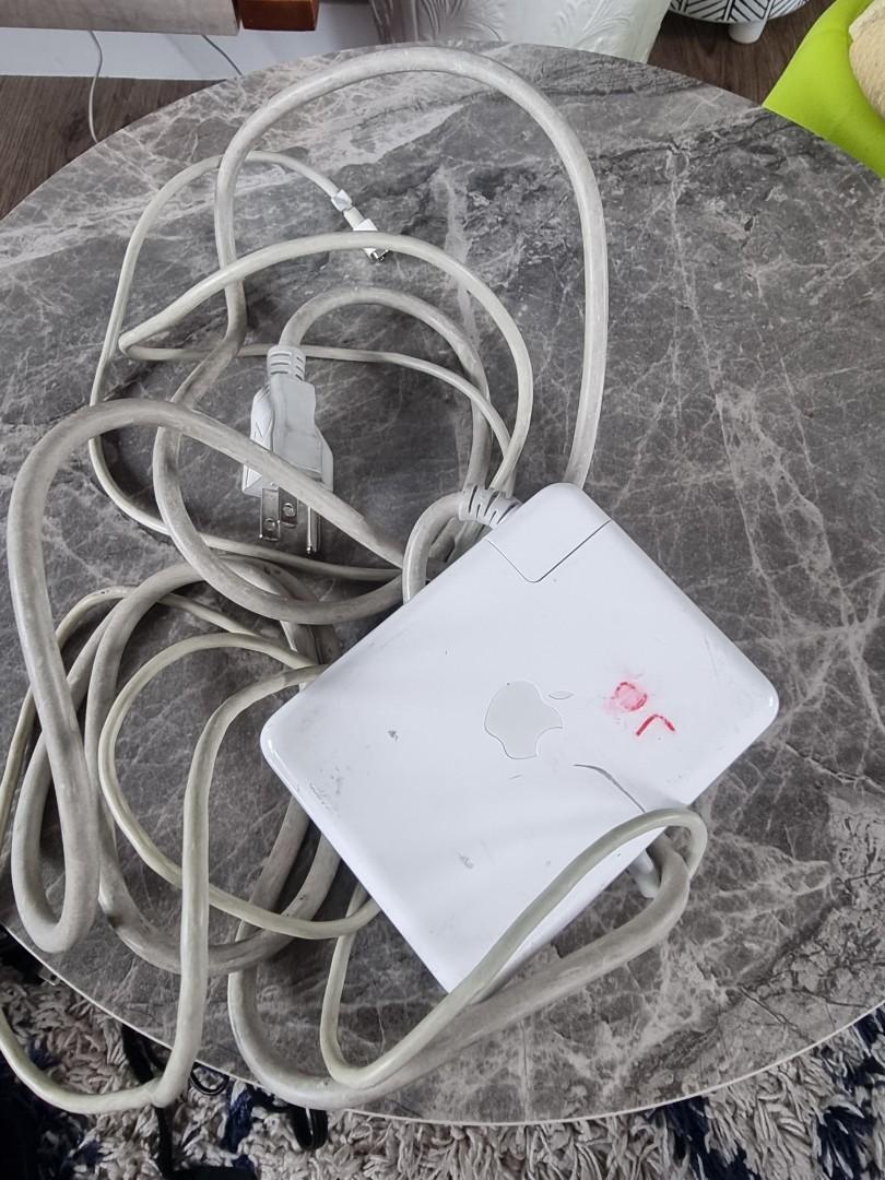 APPLE OEM 60w Macbook charger (Category: Chargers) located in Manila. Submitted by VintageNiche (Listing ID 1107267972, Image 1). Description: original working 4-pin charger for macbook. working. no issues.