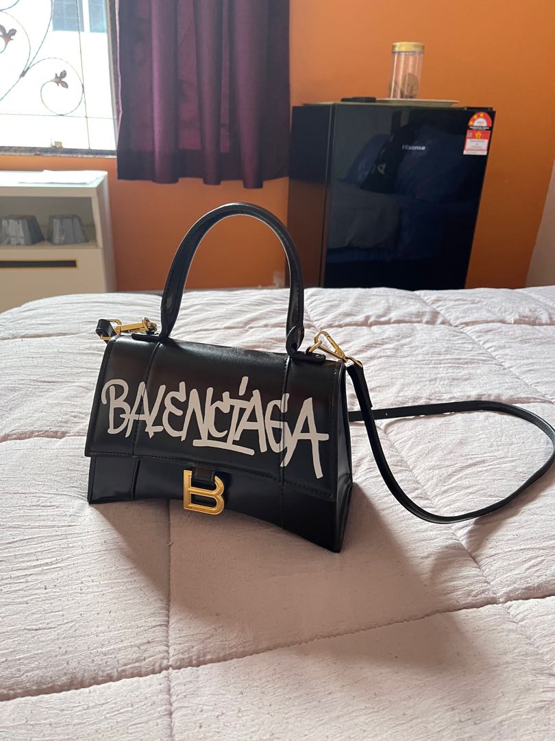 BALENCIAGA Hour glass XXS bag in graffitiprinted leather  White   Balenciaga mini bag 592833 1BWIY online on GIGLIOCOM