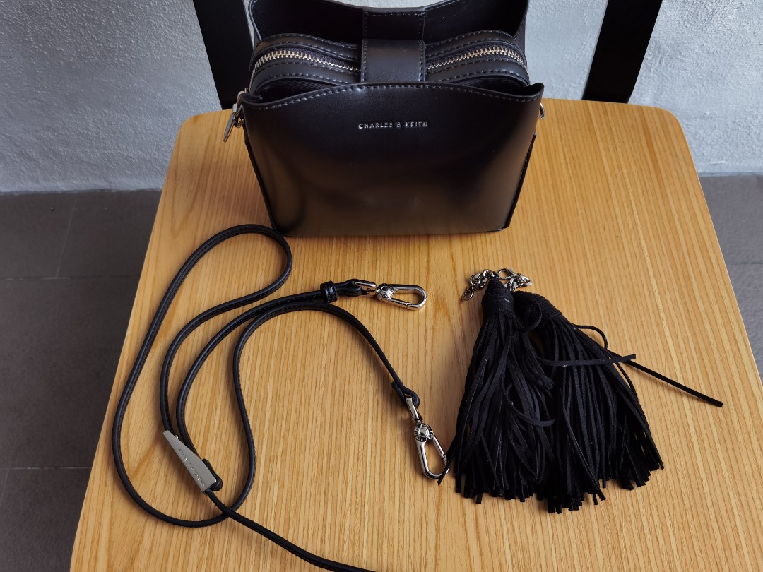 Charles and keith outlet tassel sling bag