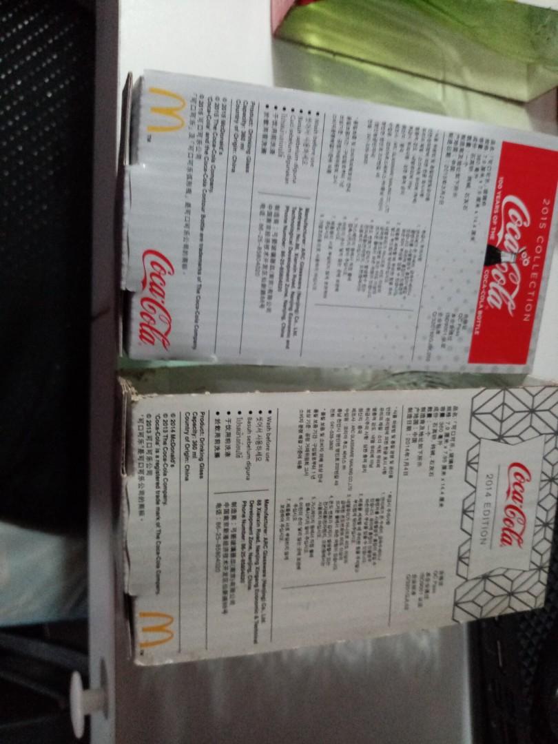 McDonald's x Coca-Cola Drinking Glasses Set (Category: Water Bottles & Tumblers) located in Mandaluyong City. Submitted by ariavictoria16 (Listing ID 1107342450, Image 2). Description: Set of Eight Charcoal (2009 & 2014 editions) Pink Purple Green (2019 & 2015 editions) Blue Lime Stored after bought. Packaging shows sign of being stored for years. The glasses are all mint condition. RFS: I'm more of a coffee drinker so I prefer mugs 😁 Payment vi