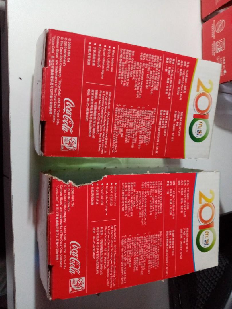 McDonald's x Coca-Cola Drinking Glasses Set (Category: Water Bottles & Tumblers) located in Mandaluyong City. Submitted by ariavictoria16 (Listing ID 1107342450, Image 3). Description: Set of Eight Charcoal (2009 & 2014 editions) Pink Purple Green (2019 & 2015 editions) Blue Lime Stored after bought. Packaging shows sign of being stored for years. The glasses are all mint condition. RFS: I'm more of a coffee drinker so I prefer mugs 😁 Payment vi