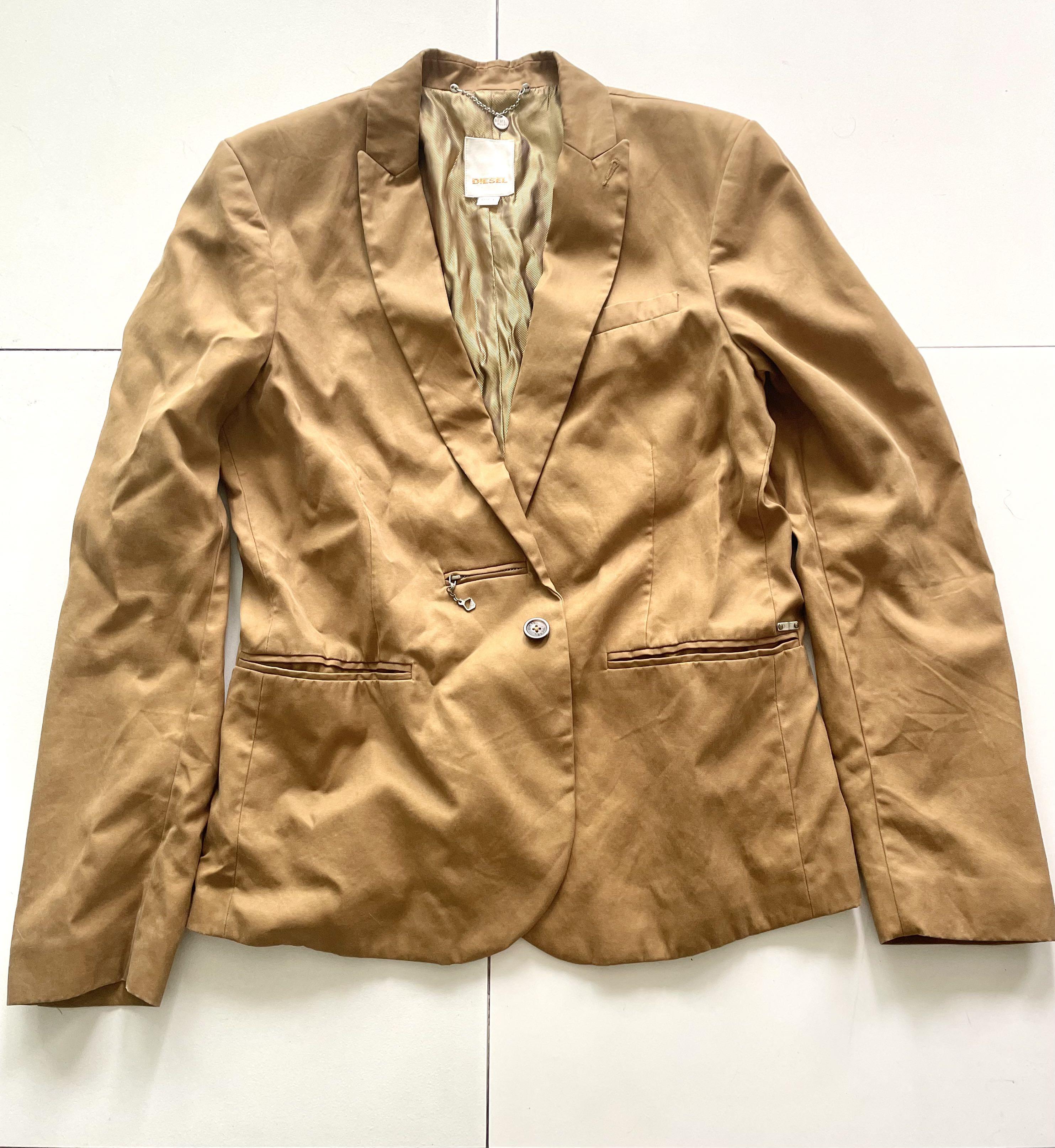 Diesel Jacket (Category: Coats, Jackets and Outerwear) located in Mandaluyong City. Submitted by edledge (Listing ID 1103345844, Image 1). Description: funky Diesel jacket for red carpet night; cool metal logo detals, used only once.