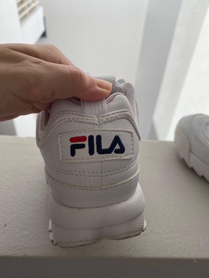 Real vs top fake fila disruptor