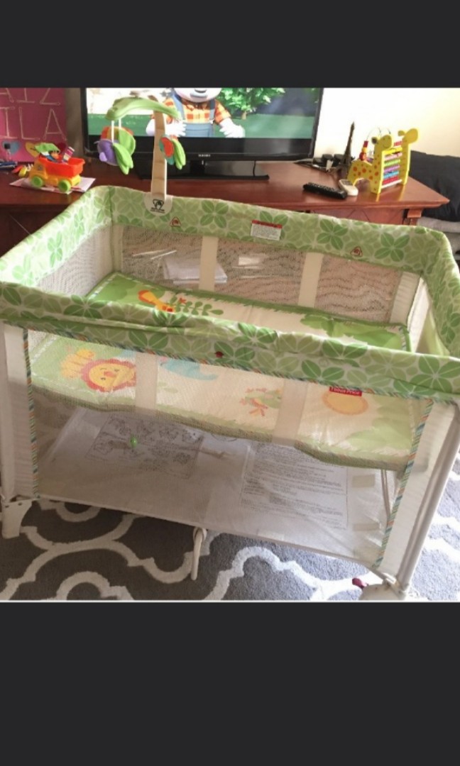 Fisher price rainforest baby cot, Babies & Kids, Baby Nursery & Kids