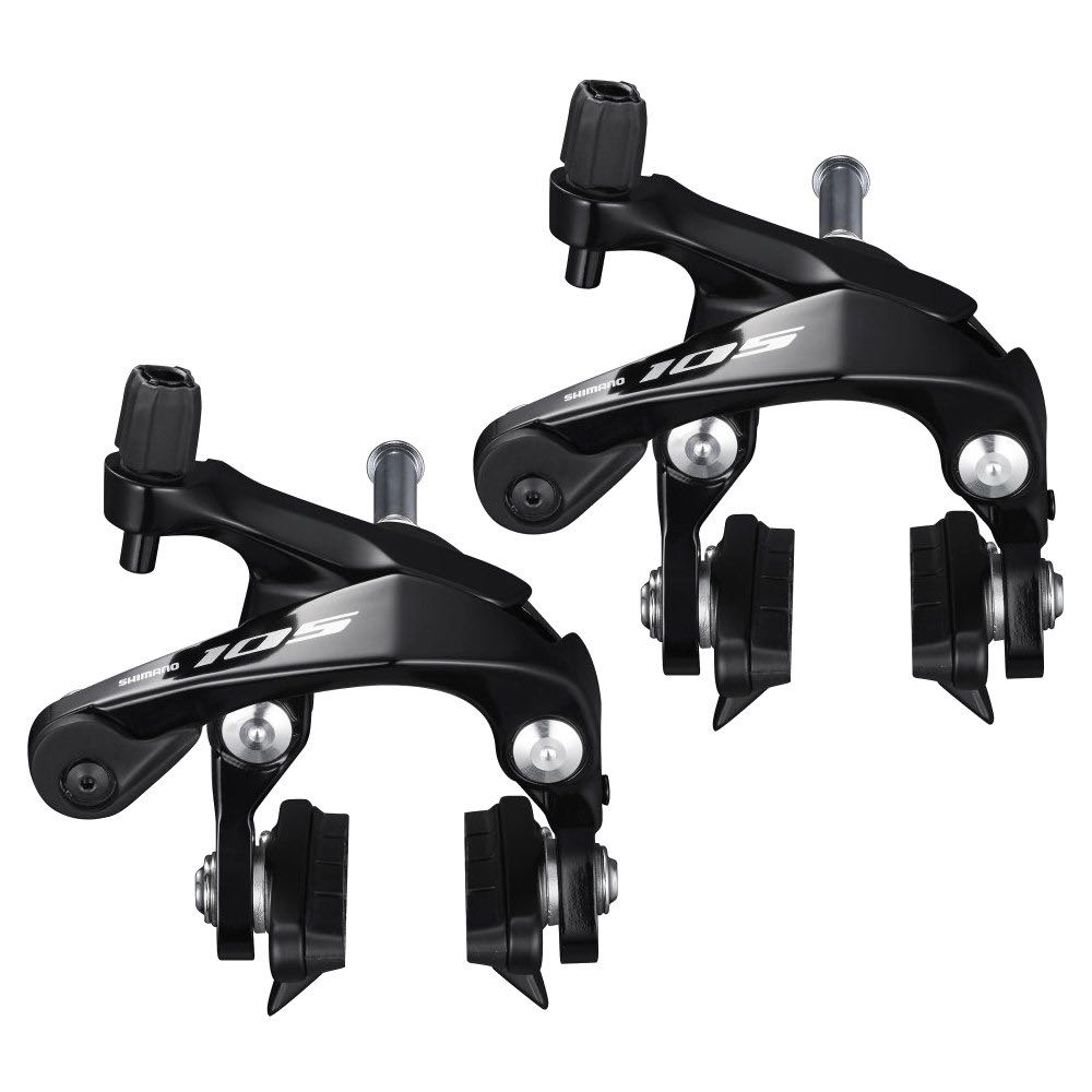 Symmetrical dual pivot brakes outlet