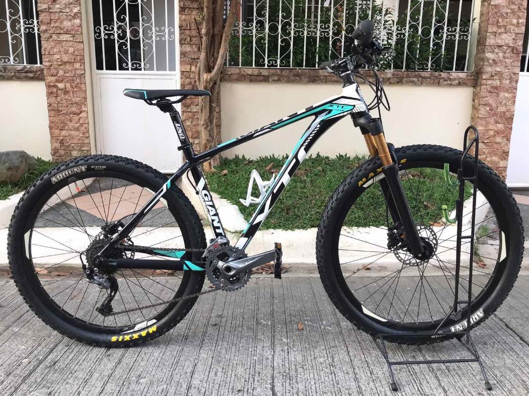 Giant XTC MTB (Category: Bicycles) located in Manila. Submitted by brian.atienza (Listing ID 253900318, Image 1). Description: Giant XTC Mtb Frame size M, Cole Stealth Black 27.5 Air Fork, Shimano SLX cogs, Shimano Alivio 9speed group set, San Marco Quadro saddle w cover, Uno seatpost, authentic Giant Connect handle bar, Giant 27.5 Rims, Atomic short stem, Wellgo pedals, Deore Sprocket free bike stand..