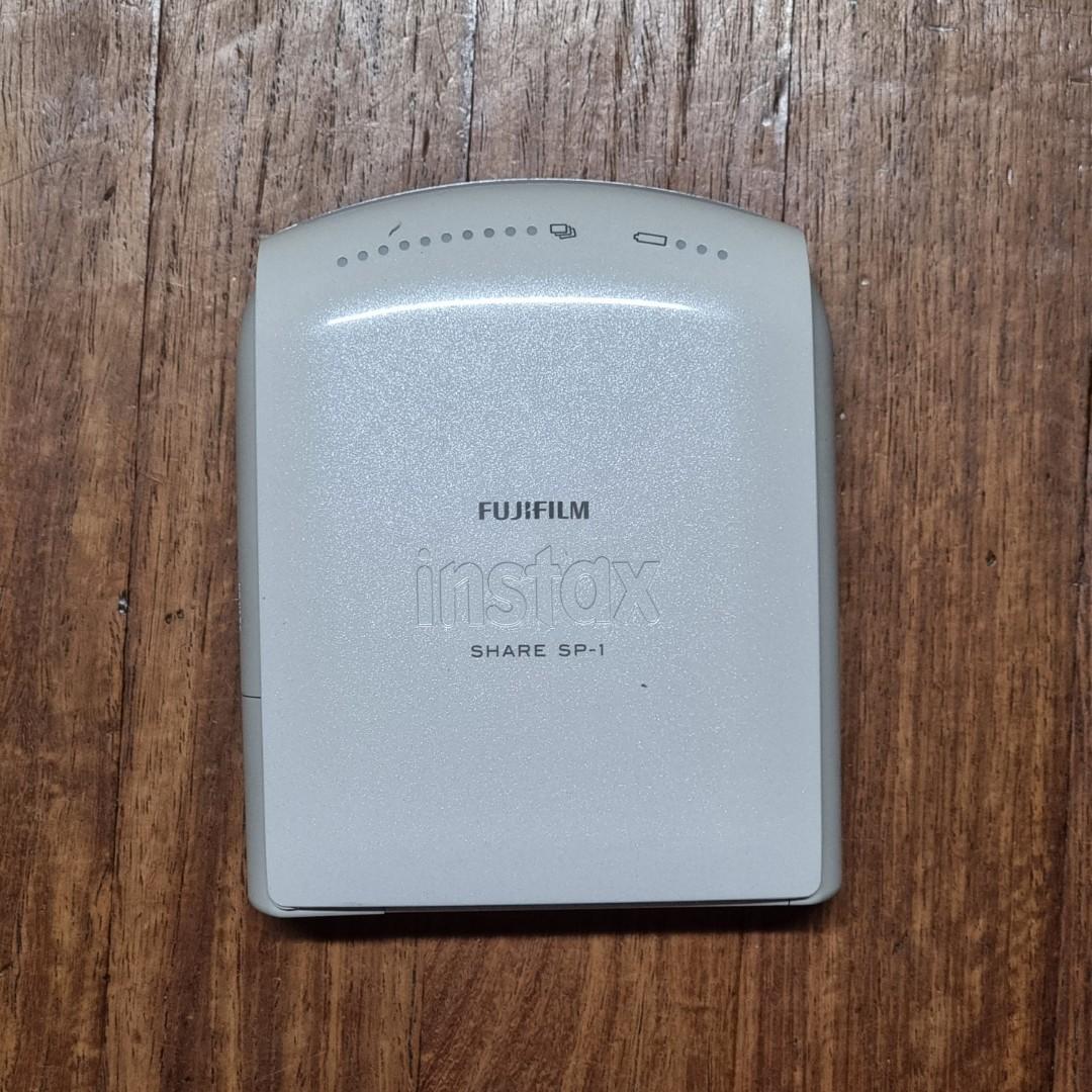 Instax Share SP-1 (Category: Printers, Scanners & Copiers) located in Cebu City. Submitted by thelyghtningstore (Listing ID 1107590502, Image 2). Description: 55% off SRP (retails for around 160 USD) Please READ before ordering: - lightly used - UNIT ONLY - NO BOX or retail packaging included - NO batteries or charger included - Price is STRICTLY NON NEGOTIABLE - Shipping fee is NOT included INSTAX SHARE SP-1 Printer lets customers print mobile p