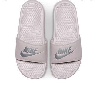 nude nike slides