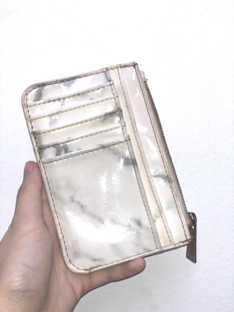Stradivarius Go-to Marble Wallet (Category: Wallets & Card holders) located in Makati City. Submitted by msverify (Listing ID 1106789406, Image 2). Description: needs cleaning lang.