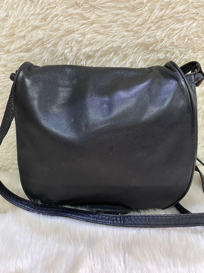 💯 Authentic YSL Vintage bag (Category: Luxury Bags & Wallets) located in Cagayan de Oro. Submitted by riggstuffs (Listing ID 1097287491, Image 3). Description: Preloved bag and guaranteed authentic The exterior part has no flaws, pleated leather, and is adjustable in size. The Interior material is soft leather. The dimension of the bag is as follows: Height is 18 cm Length is 24cm Drop of the sling is 52cm Rank A DISCLAIMER: Riggstuffs is not af