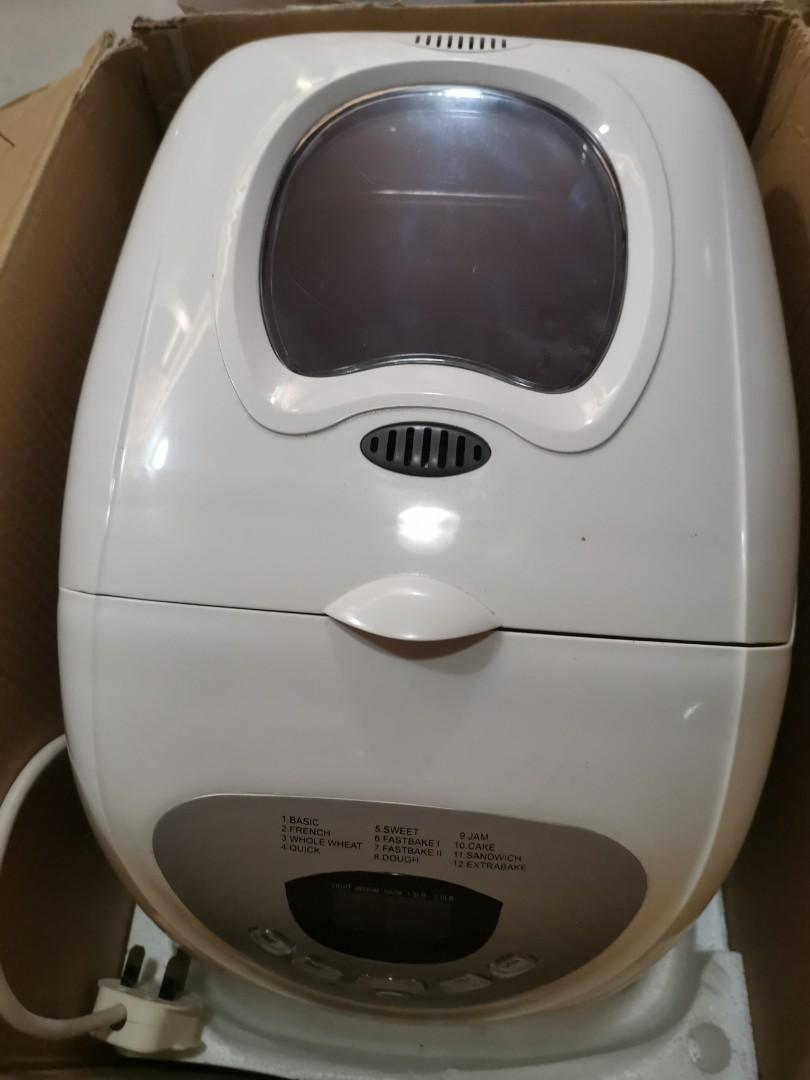 Breadmaker Morphy Richards (Category: Breadmakers) located in Singapore. Submitted by saisk95 (Listing ID 1107675090, Image 2). Description: Bought for 120 used hardly thrice and reduced for quick clearance The machine is fast bake variety and is in pristine condition still in box but no instructions(can be downloaded from the net).