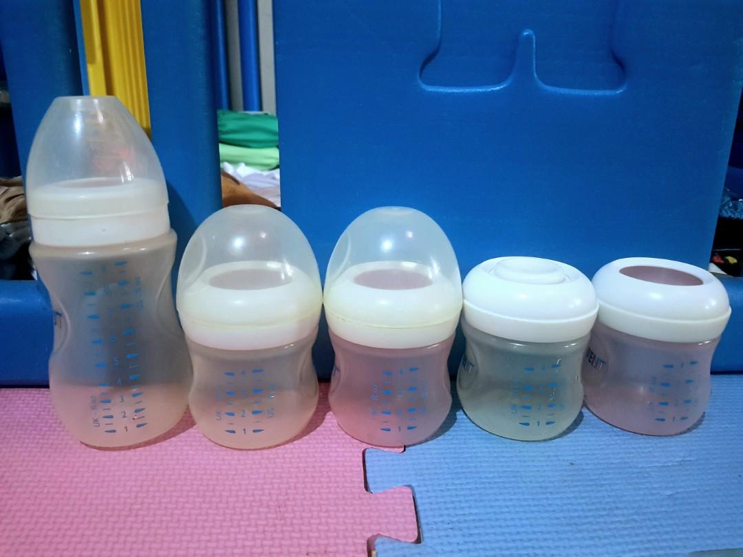 Avent baby bottle take all (Category: Breastfeeding & Bottle Feeding) located in Marikina City. Submitted by mamazang (Listing ID 1107894581, Image 2). Description: 5 feeding bottles - all no teats/nipples - only 3 has caps (9oz cap is not the original cap) - 1 have sealing disc - yellowish due to usage - all measurements are still readable with some very little to minor ink chipped. update: we found another cap so there are already 4..