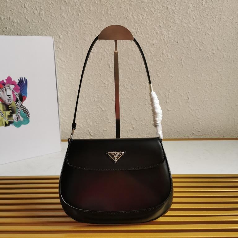 Prada Cleo brushed leather shoulder bag with flap, Women's Fashion, Bags &  Wallets, Purses & Pouches on Carousell