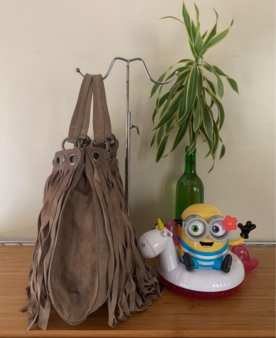 Authentic Miu Miu fringe suede leather bag (Category: Luxury Bags & Wallets) located in Muntinlupa City. Submitted by mjas_treasures (Listing ID 1108158631, Image 3). Description: ig: mjas_treasures Authentic Miu Miu fringe suede leather bag. Made in Turkey 🇹🇷 MOP: BDO or BPI RFS: decluttering 🤗Preloved bag please manage your expectations. Bawal po sa maarte at maselan! 🚫No return, no exchange, no refund!.