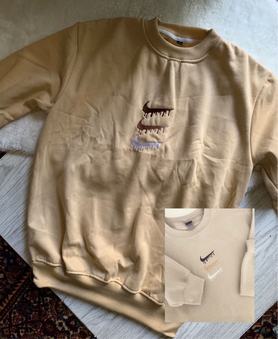 nike drip crewneck