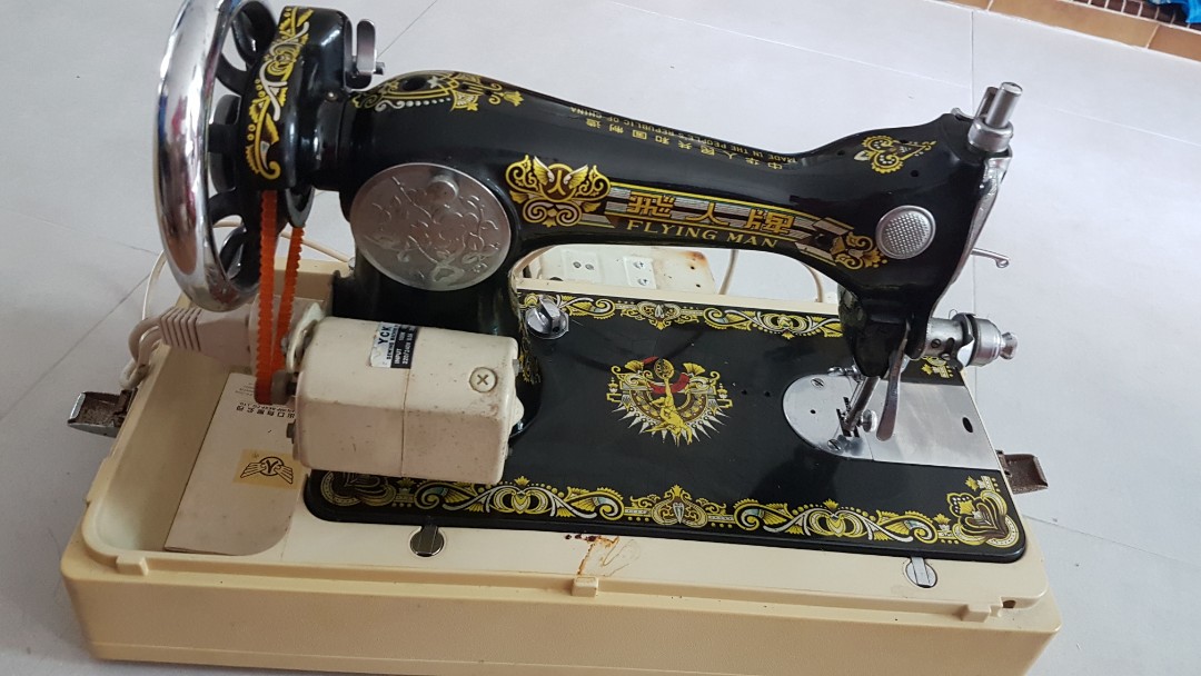 Vintage Flying Man Sewing Machine, Hobbies & Toys, Memorabilia