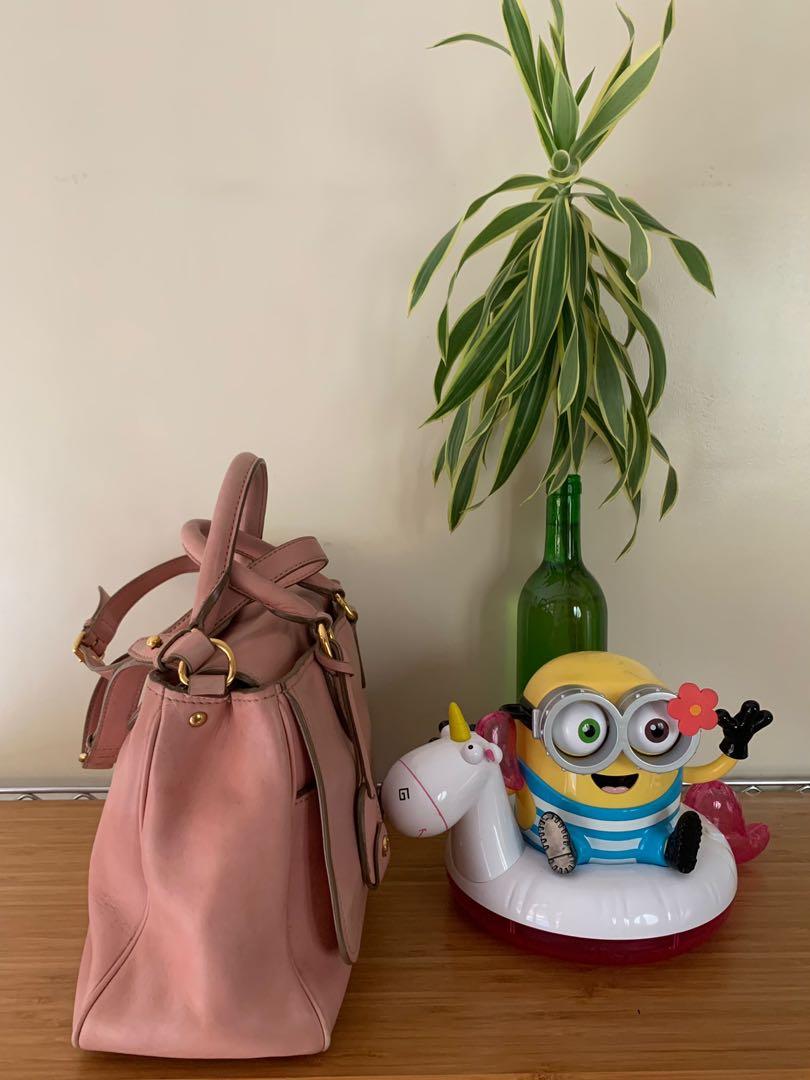 Authentic Miu Miu two way bag (Category: Luxury Bags & Wallets) located in Muntinlupa City. Submitted by mjas_treasures (Listing ID 1108391751, Image 3). Description: ig: mjas _treasures Authentic Miu miu two way bag. Made in Turkey 🇹🇷 MOP: BDO or BPI RFS: decluttering 🤗Preloved bag please manage your expectations. Bawal po sa maarte at maselan! 🚫No return, no exchange, no refund!.