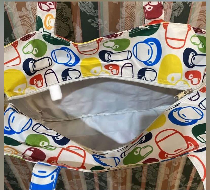 Baby Milo Multi Color Diaper Bag (Category: Diaper Bags & Wetbags) located in Pasig City. Submitted by danielle_mikael (Listing ID 1108382013, Image 3). Description: Diaper Bag 9/10 condition No issues Plus shipping fee.