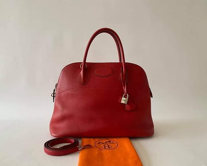 Hermes Bolide 35 Rouge Casaque (Category: Luxury Bags & Wallets) located in Manila. Submitted by bagislifeshop (Listing ID 1108328938, Image 1). Description: 95% NEW HERMES BOLIDE 35 ROUGE CASAQUE Store Price almost 500,000 Rouge Casaque -designer colour Taurillon Clemence leather Palladium hardware Letter stamp-H Dimensions-14"x11"x6" Handle drop-5" Detachable strap- 17" drop Gently used, mint condition Comes w/ strap, dustbag Clochette, padlock
