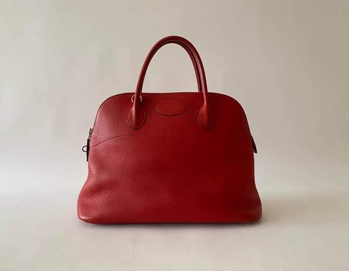 Hermes Bolide 35 Rouge Casaque (Category: Luxury Bags & Wallets) located in Manila. Submitted by bagislifeshop (Listing ID 1108328938, Image 3). Description: 95% NEW HERMES BOLIDE 35 ROUGE CASAQUE Store Price almost 500,000 Rouge Casaque -designer colour Taurillon Clemence leather Palladium hardware Letter stamp-H Dimensions-14"x11"x6" Handle drop-5" Detachable strap- 17" drop Gently used, mint condition Comes w/ strap, dustbag Clochette, padlock