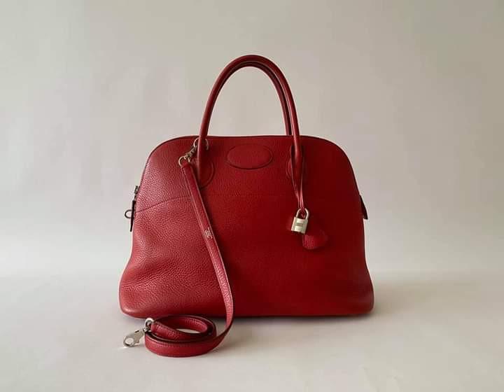 Hermes Bolide 35 Rouge Casaque (Category: Luxury Bags & Wallets) located in Manila. Submitted by bagislifeshop (Listing ID 1108328938, Image 2). Description: 95% NEW HERMES BOLIDE 35 ROUGE CASAQUE Store Price almost 500,000 Rouge Casaque -designer colour Taurillon Clemence leather Palladium hardware Letter stamp-H Dimensions-14"x11"x6" Handle drop-5" Detachable strap- 17" drop Gently used, mint condition Comes w/ strap, dustbag Clochette, padlock
