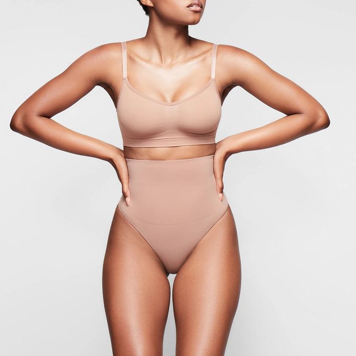 SKIMS LOGO MESH THONG SIENNA / S, Women's Fashion, New Undergarments &  Loungewear on Carousell