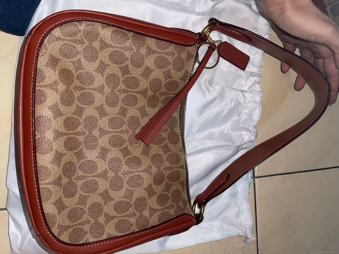 Coach signature sutton crossbody deals
