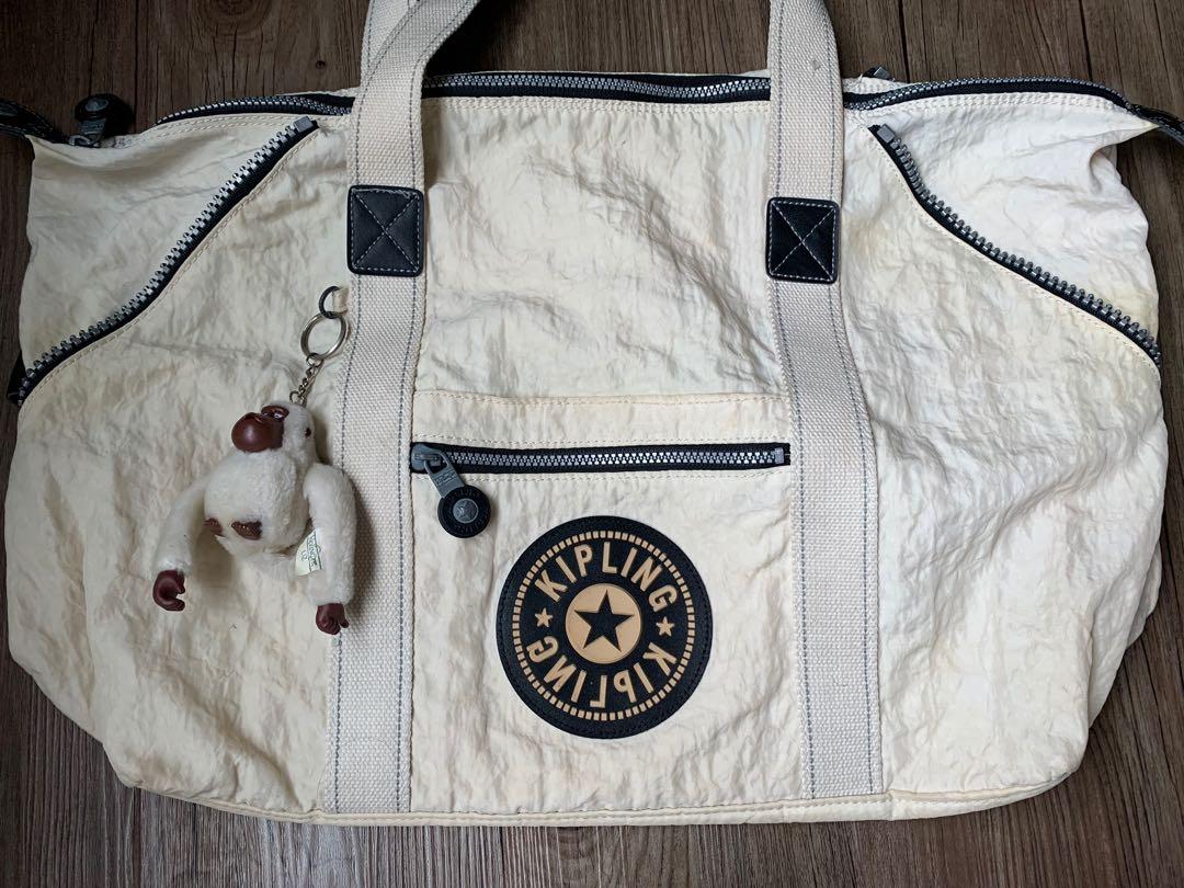 Kipling (Category: Bags & Wallets) located in Singapore. Submitted by lmfsl (Listing ID 1108802720, Image 3). Description: Kipling Vintage 90s Kipling Duffel White Cream colour. In good condition Kipling Bags Travel Bags Things to take note. There’s a stain on the handle as shown on pic 7 . 📣HOUSE CLEARANCE SALES! The colour not balance Not for fussy buyer No trades.