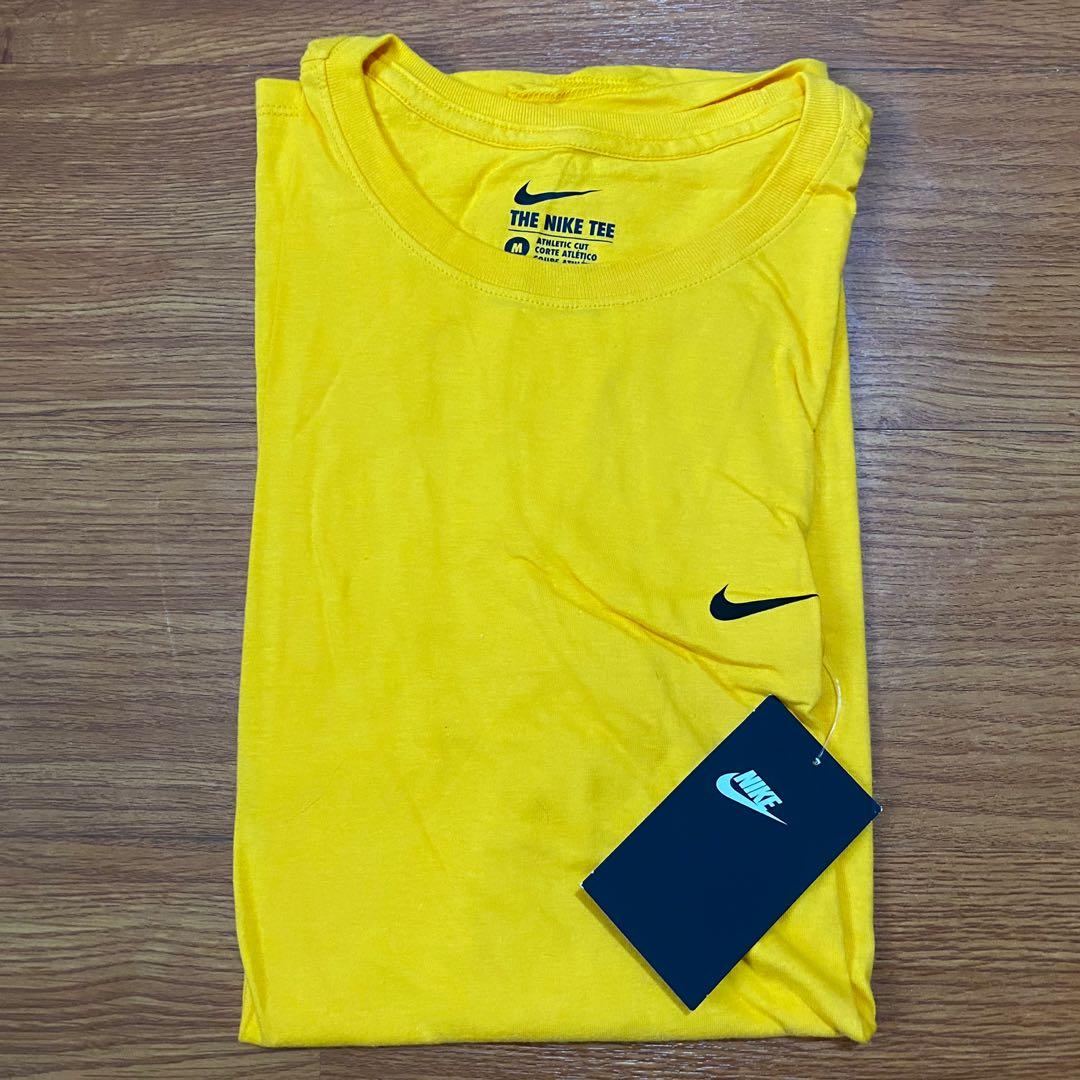 mustard yellow nike shirt