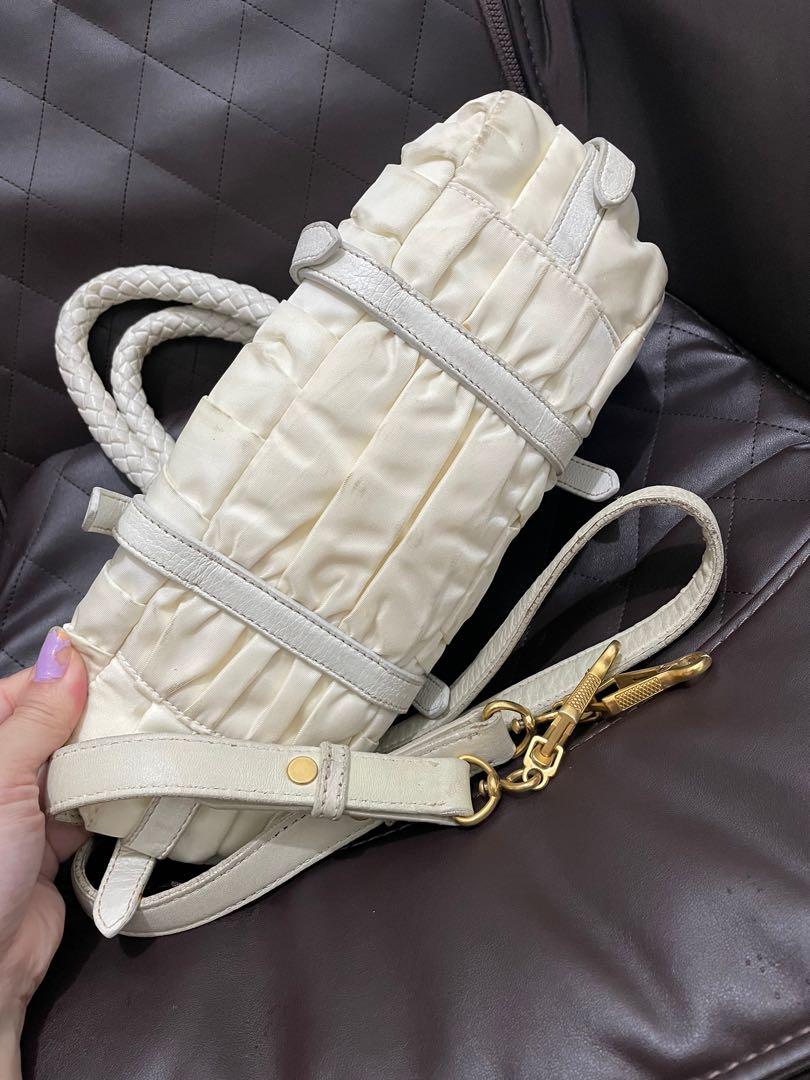 Prada Gaufre Canvas Leather 2 Way bag (Category: Luxury Bags & Wallets) located in Caloocan City. Submitted by prelovedbymaria27 (Listing ID 1108823555, Image 3). Description: With strap Good Condition.