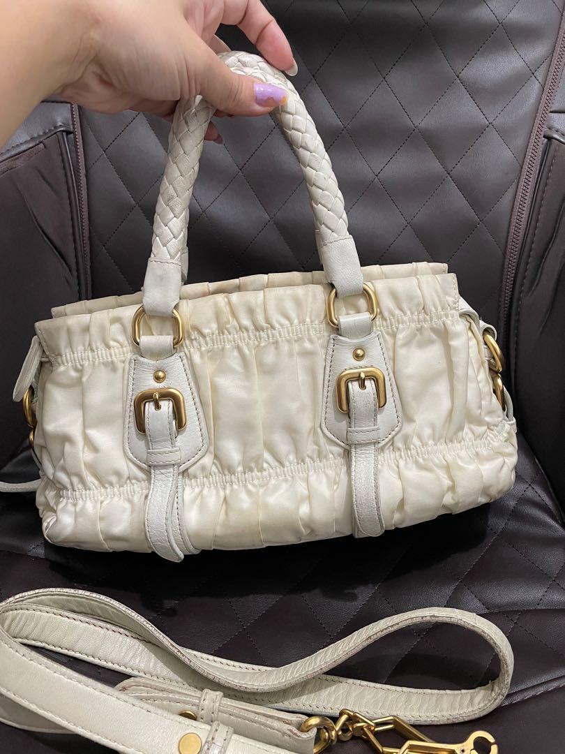 Prada Gaufre Canvas Leather 2 Way bag (Category: Luxury Bags & Wallets) located in Caloocan City. Submitted by prelovedbymaria27 (Listing ID 1108823555, Image 2). Description: With strap Good Condition.