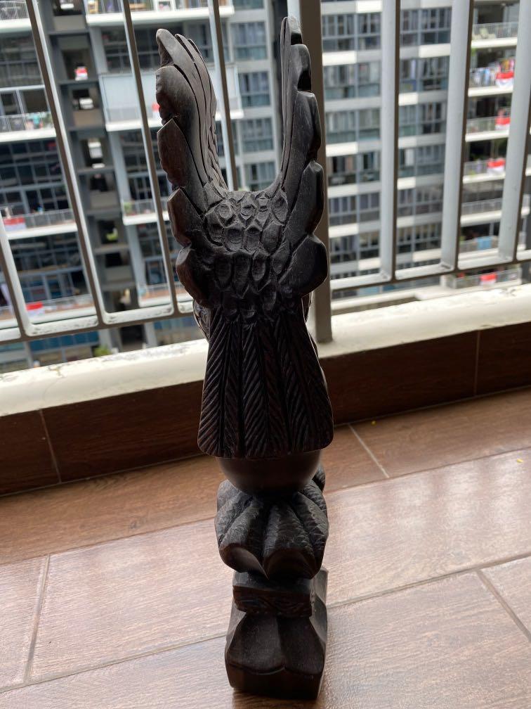 Solid wood eagle 30cm height (Category: Other Home Decor) located in Singapore. Submitted by shin159 (Listing ID 1108734819, Image 3). Description: Unique eagle carving from solid wood.