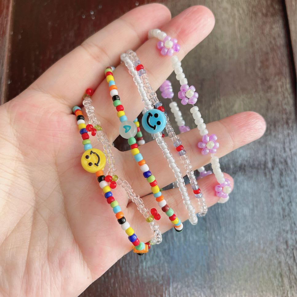 Handmade korean elastic daisy flower beads bracelet arm candy and ring,  Women's Fashion, Jewelry & Organisers, Precious Stones on Carousell