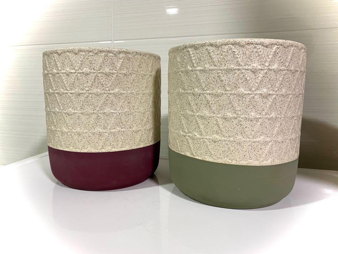 Triangle Pattern Pots (Category: Pots & Planters) located in Singapore. Submitted by earthysproutssg (Listing ID 1109075722, Image 2). Description: I see ..... cascading triangles! Lovely triangular ridges flowing down the sides of these two pots culminating in a maroon and olive solid base! These two pots are sizeable and beautiful and great value for morning for your greens! $22/each Press #earthysproutsavail to see all items that are in stock!