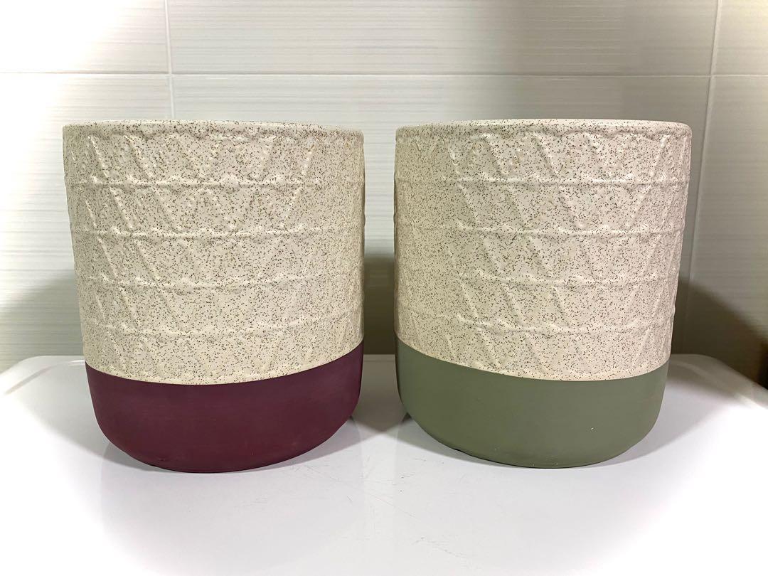 Triangle Pattern Pots (Category: Pots & Planters) located in Singapore. Submitted by earthysproutssg (Listing ID 1109075722, Image 1). Description: I see ..... cascading triangles! Lovely triangular ridges flowing down the sides of these two pots culminating in a maroon and olive solid base! These two pots are sizeable and beautiful and great value for morning for your greens! $22/each Press #earthysproutsavail to see all items that are in stock!