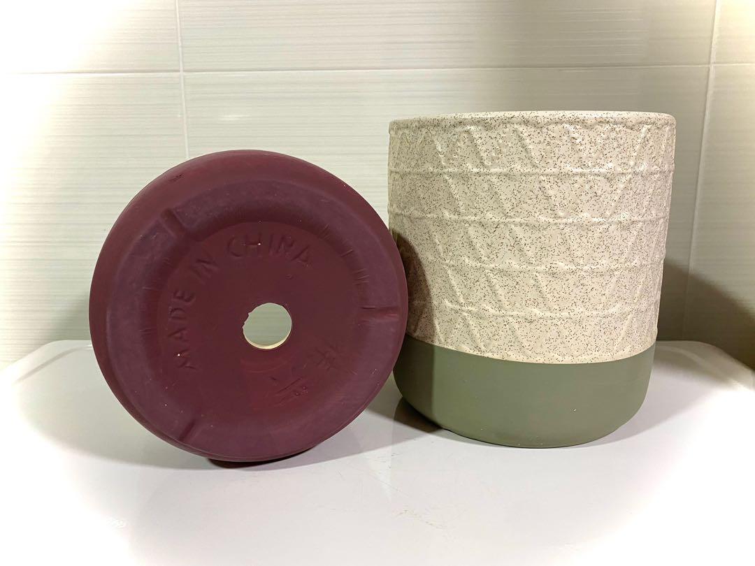 Triangle Pattern Pots (Category: Pots & Planters) located in Singapore. Submitted by earthysproutssg (Listing ID 1109075722, Image 3). Description: I see ..... cascading triangles! Lovely triangular ridges flowing down the sides of these two pots culminating in a maroon and olive solid base! These two pots are sizeable and beautiful and great value for morning for your greens! $22/each Press #earthysproutsavail to see all items that are in stock!