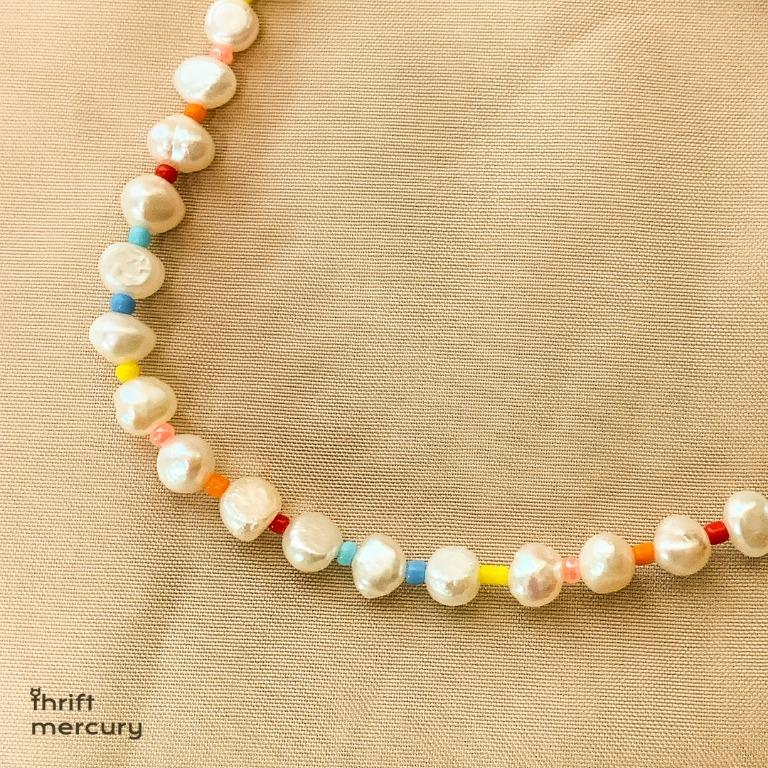 Y2K Pearl and Rainbow Beaded Necklace (Category: Necklaces) located in Las Pinas. Submitted by cosmicdeclutter (Listing ID 1109133375, Image 1). Description: The "Bahaghari" beaded necklace. Designed for everyone, regardless of gender. Designed and handmade by @thriftmercury -very coconut girl kind of look 🌴 .
