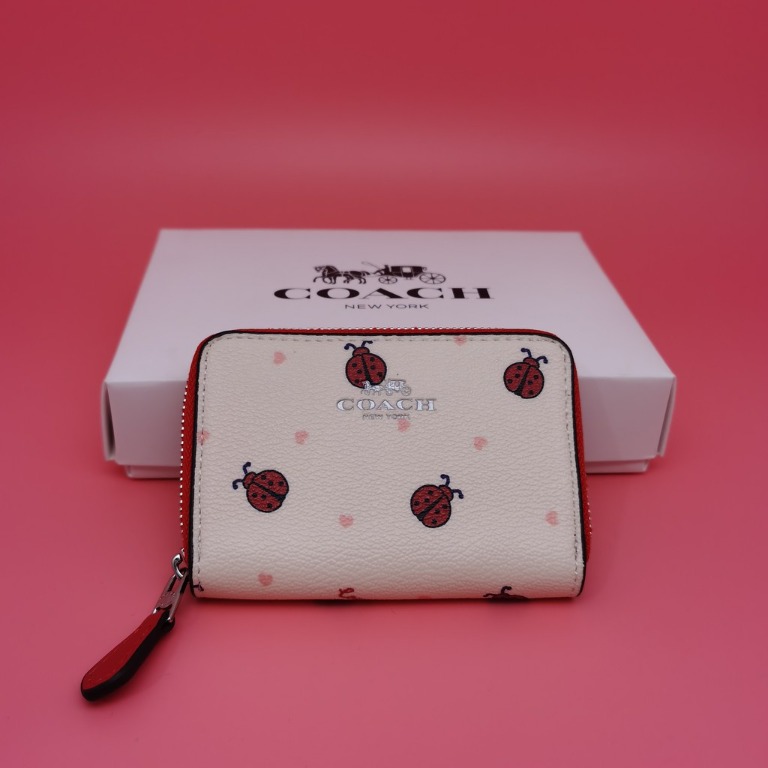 Coach ladybug on sale makeup bag