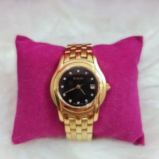 Gucci watch with diamonds