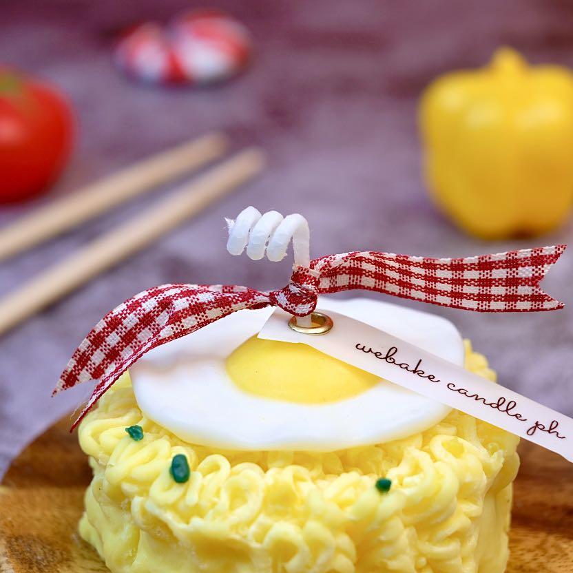 Chinese Noodles with Egg Candle (Category: Other Home Decor) located in Caloocan City. Submitted by webakecandleph (Listing ID 1109498204, Image 1). Description: Dessert candles, made by WeBake Candle, are designed to look and smell good enough to eat, but please don't eat our candles, although they made from Vegan Soy wax and natural fragrance oils, you cannot eat them. -approx. 100g -chinese noodles and a sunny side up ***unscented*** .
