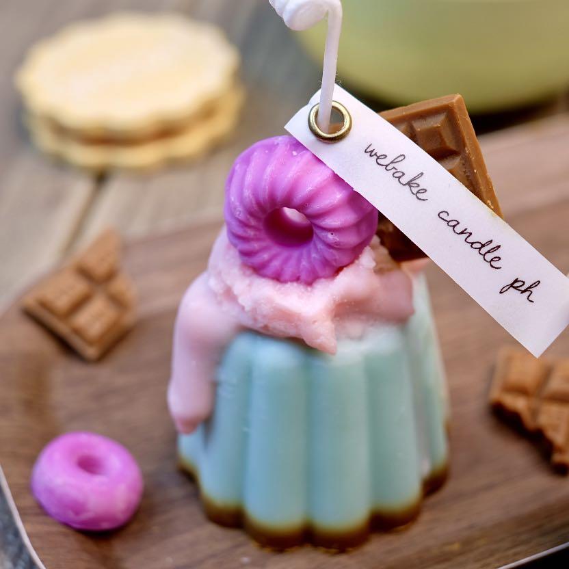 Jello Yogurt Candle (Category: Other Home Decor) located in Caloocan City. Submitted by webakecandleph (Listing ID 1109511090, Image 3). Description: Dessert candles, made by WeBake Candle, are designed to look and smell good enough to eat, but please don't eat our candles, although they made from Vegan Soy wax and natural fragrance oils, you cannot eat them. -approx. 80g -jello shot with creamy frosting, candy and chocolate toppings ***choice of