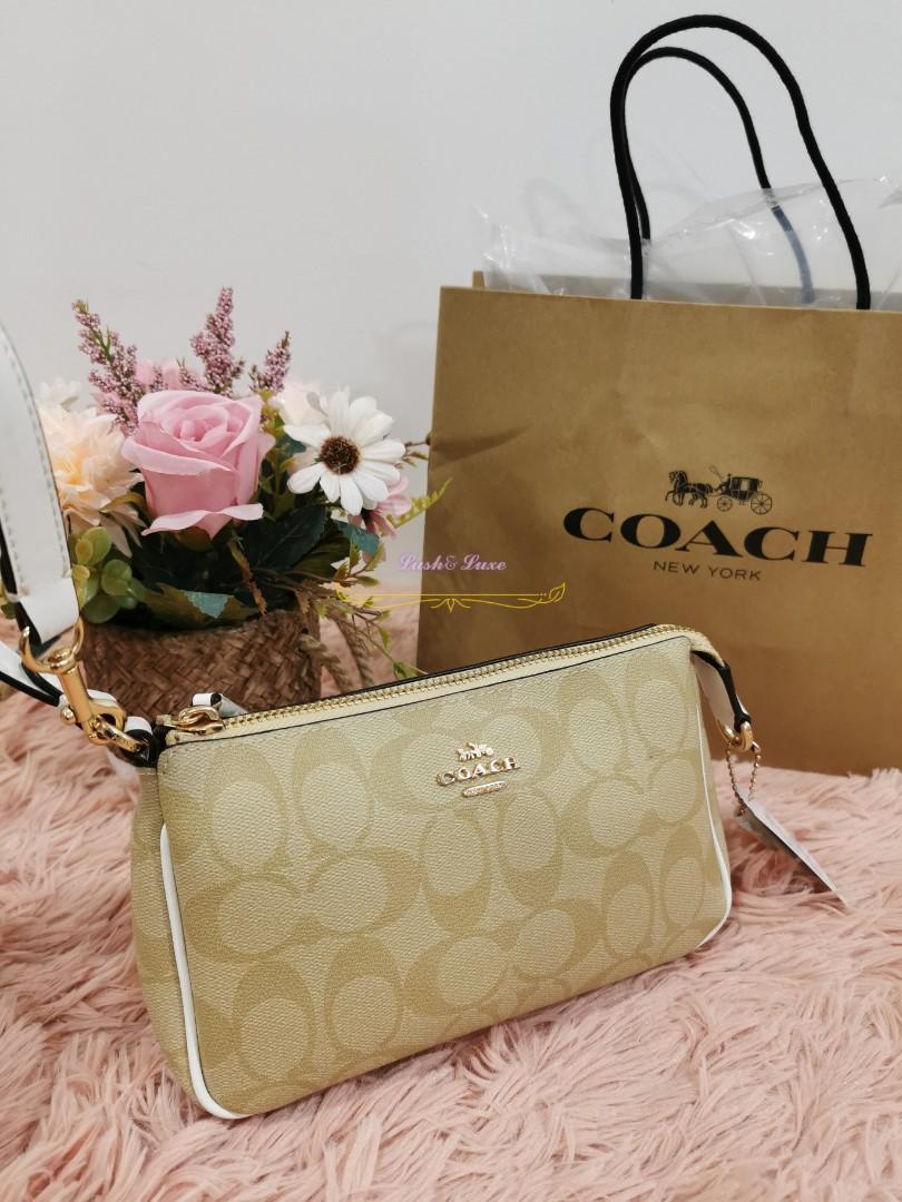 Coach Nolita 19 white light brown signature Canvas, Women's Fashion, Bags &  Wallets, Purses & Pouches on Carousell