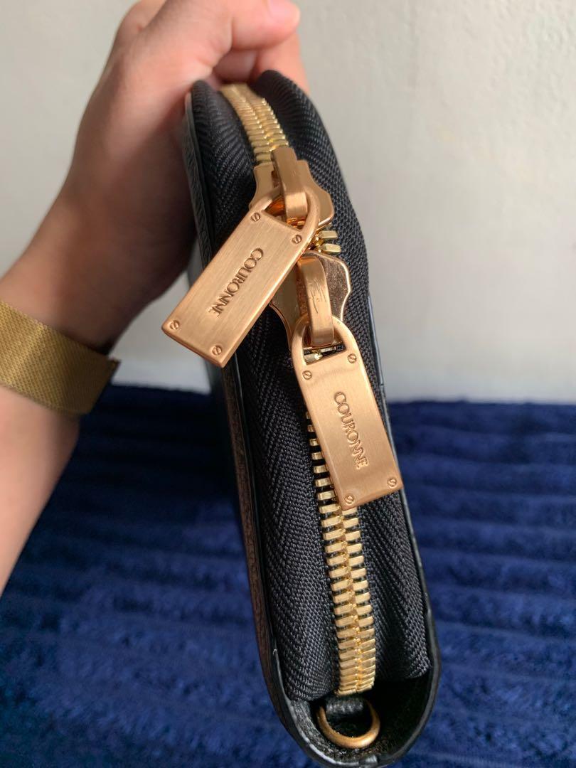Couronne two way bag (Category: Luxury Bags & Wallets) located in Makati City. Submitted by paraisodeclutters (Listing ID 1109852018, Image 2). Description: Kili kili bag and clutch. Never been used. Only stored in closet. L: Upper: 10.8, lower: 10” W: 1.3” H: 6” Strap drop: 16”.