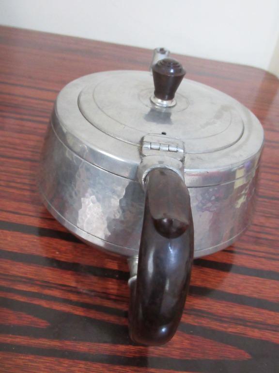 Vintage Pewter Teapot set from England (Category: Other Home Decor) located in Mangaldan. Submitted by thriflip_online_shop (Listing ID 1109877059, Image 3). Description: Vintage knighthood old English hand-hammered pewter tea set teapot sugar bowl and milk jug. The handle is made of bakelite. There are scratches and dents, especially on the teapot. All aspects of the item were captured in photos. Please view images carefully to determine the con