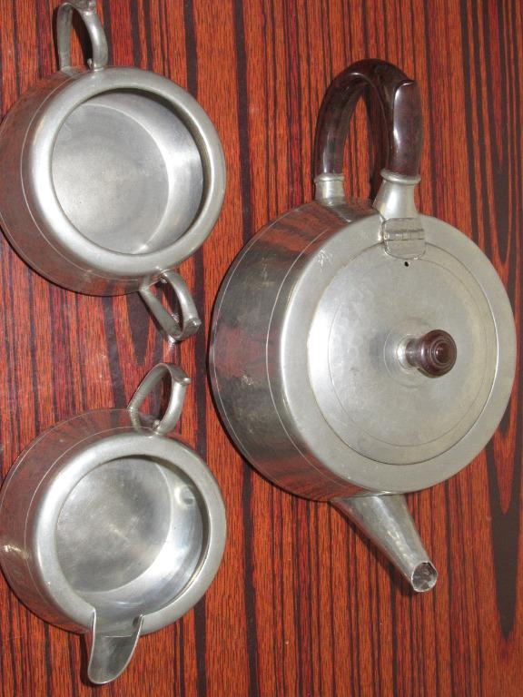 Vintage Pewter Teapot set from England (Category: Other Home Decor) located in Mangaldan. Submitted by thriflip_online_shop (Listing ID 1109877059, Image 2). Description: Vintage knighthood old English hand-hammered pewter tea set teapot sugar bowl and milk jug. The handle is made of bakelite. There are scratches and dents, especially on the teapot. All aspects of the item were captured in photos. Please view images carefully to determine the con