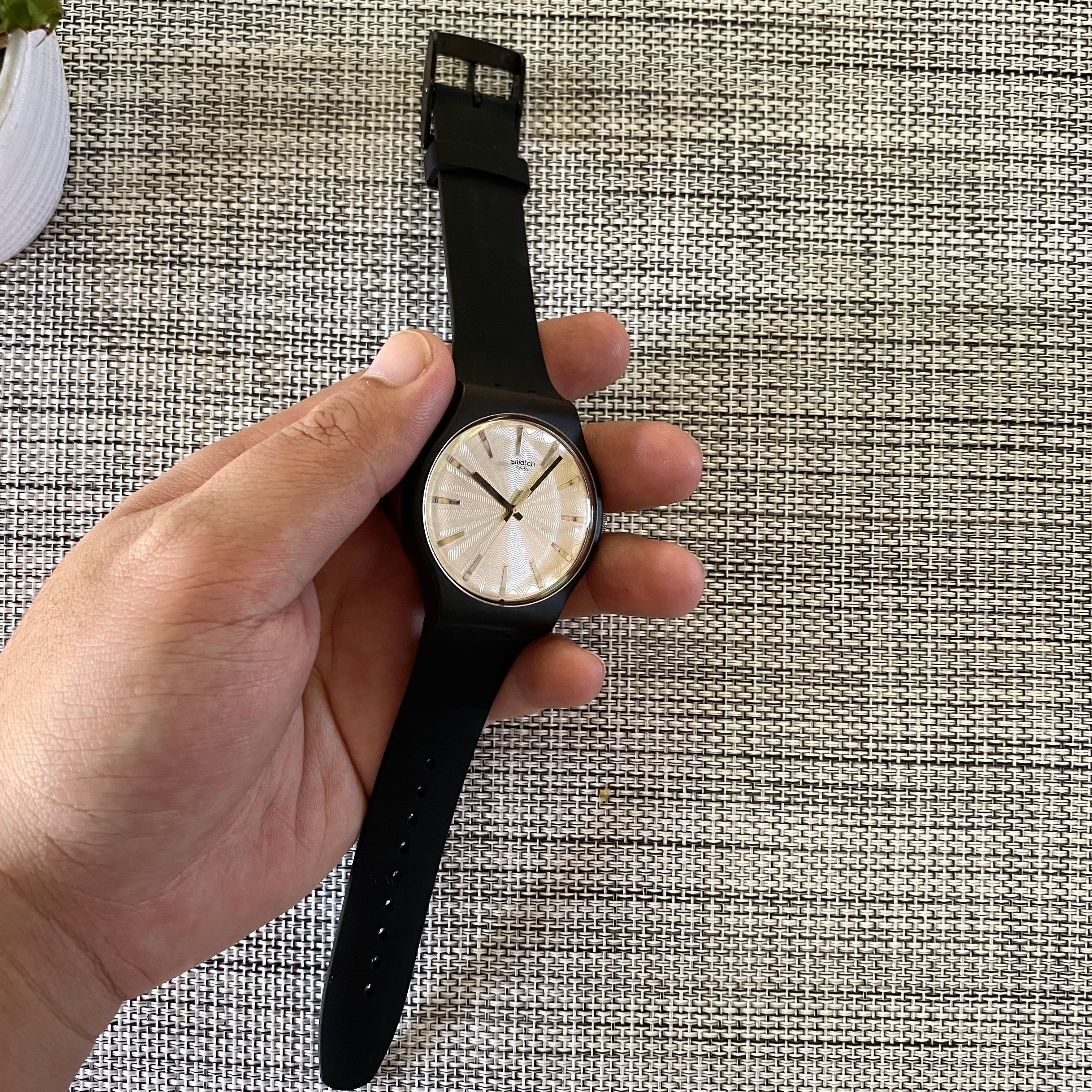 Swatch deals silver shield