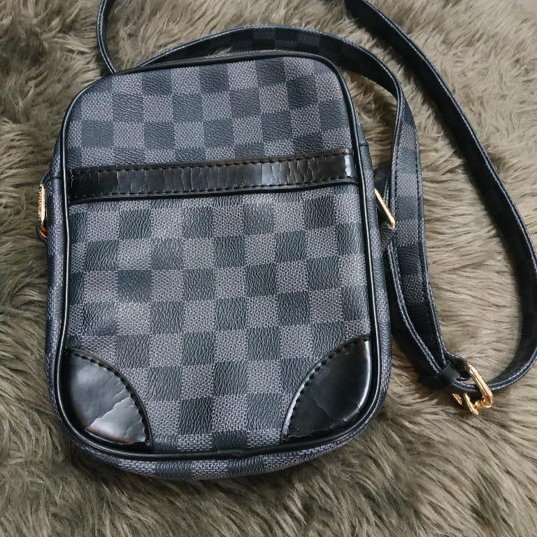 LV Graphite Sling Crossbody Bag (Category: Luxury Bags & Wallets) located in Manila. Submitted by shopaholic_gurl (Listing ID 1109924690, Image 1). Description: Preloved sling bag with leather flaw some leather cracks as per pics posted Sold as is Payment first prior to shipment MOP: GCASH, PAYMAYA, BDO, Palawan.